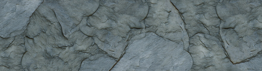 The texture of the stone wall. Close-up. Light gray rock backdrop.