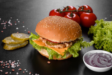Delicious fresh burger grill with a bun, cheese and meat