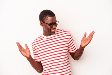 Young African American man isolated on white background joyful laughing a lot. Happiness concept.