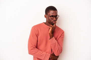 Young African American man isolated on white background contemplating, planning a strategy, thinking about the way of a business.
