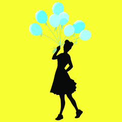 festive background, silhouette of a girl with a bunch of balloons in her hand