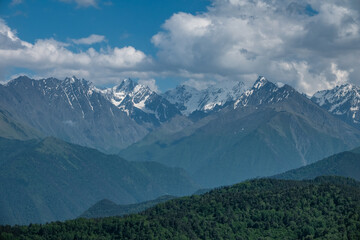 Obraz premium Landscape with Snow-Capped Summits of the Caucasus Mountains in Ingushetia