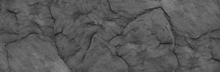 Abstract dark grey black slate background or texture.