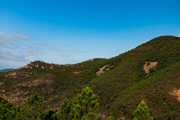 Fototapeta premium Beautiful Panoramic Views on the mountains from the top of Cap Esterel. Hiking Adventures. Rocky Mountains. Provence, South of France.