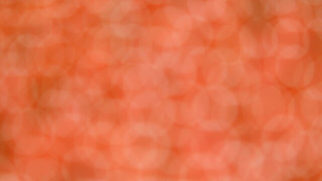 Abstract 4k stock video bright orange shiny circles background