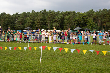 Garland and fencing of crowds of people from the place of the races. Public outdoor event
