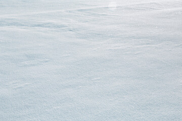 Natural snow texture, white blue snowy background, frozen surface