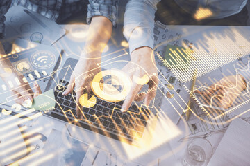 Double exposure of man and woman working together and technology theme drawing. Computer background. Top View. High tech concept.