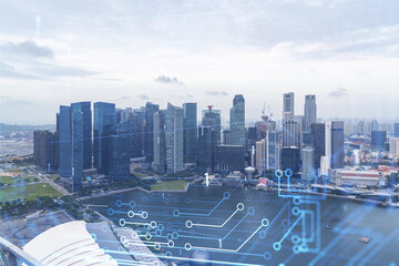 Naklejka na ściany i meble Technology hologram over panorama city view of Singapore. The largest tech hub in Asia. The concept of developing coding and high-tech science. Double exposure.