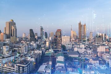 Fototapeta na wymiar Glowing FOREX graph hologram, aerial panoramic cityscape of Bangkok at sunset. Stock and bond trading in Southeast Asia. The concept of fund management. Double exposure.