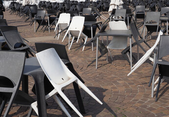 plastic chairs and tables at alfresco bar