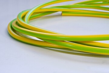 Small roll of yellow and green grounding cable