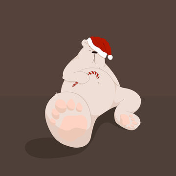 Sitting Christmas white bear with  a candy