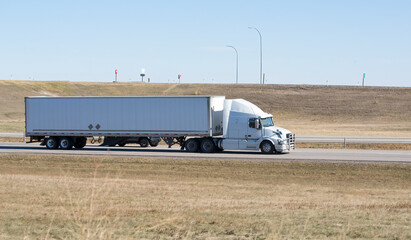 Heavy Cargo on the Road. A truck hauling freight along a highway