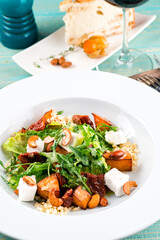 warm salad with pumpkin and bulgur. Vegan bowl with bulgur and pumpkin