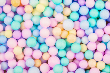 Foam beads of various colors brightly colored.