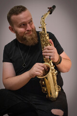 Portrait of a man with a saxophone