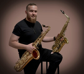 Fototapeta na wymiar Portrait of a man with a saxophone