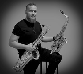 Fototapeta na wymiar Portrait of a man with a saxophone