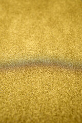 Abstract gold glitter sparkle bokeh light background. Merry Christmas and Happy New Year. Christmas, winter, new year concept. Greeting card, banner with place for text. Winter holiday xmas theme