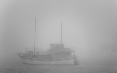 old ship in the sea fog