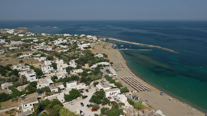 Aerial drone photo of small harbour of Molos a traditional boat safe anchorage near popular beach...