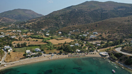 Obraz premium Aerial drone photo of organised sandy beach of Aherounes near picturesque main port of Skiros or Skyros island, Sporades, Greece
