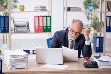 Old male employee and too much work in the office