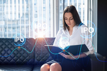 Portrait of attractive businesswoman in formal wear working with documents and thinking how to...