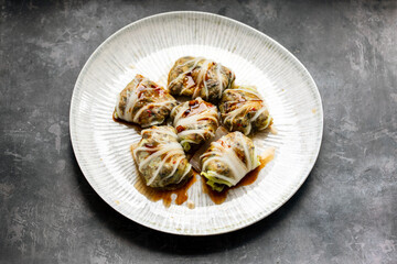 Chinese leaf parcels with mushroom filling in oyster sauce
