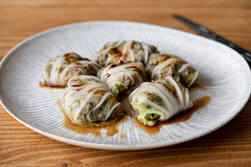Chinese leaf parcels with mushroom filling in oyster sauce