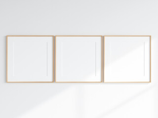 poster frame mockup, three square wooden frames with matt on the wall, 3d render