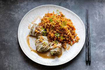 Chinese leaf parcels with mushroom filling in oyster sauce with nasi goreng rice