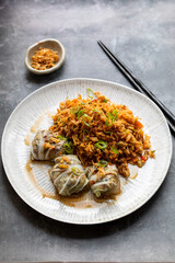 Chinese leaf parcels with mushroom filling in oyster sauce with nasi goreng rice