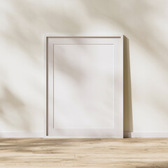 blank white frame with mat mock up, poster frame on wooden floor with sunlight with leaves shadow on white wall, 3d rendering
