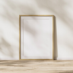 blank wooden frame with mat mock up, wooden poster frame on wooden floor with sunlight with leaves shadow on white wall, 3d rendering