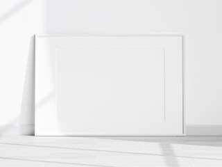 horizontal white frame mockup on the wooden floor with matt