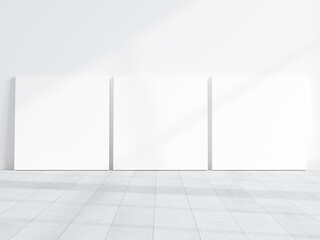 three square canvases mockup on the floor