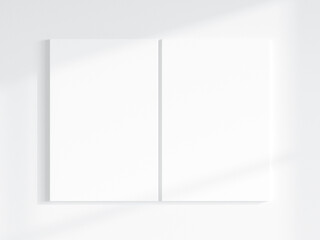 two vertical canvases mockup on the wall