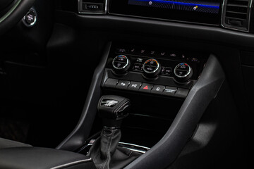 Fototapeta premium Digital control panel car air conditioner dashboard. Modern car interior conditioning buttons inside a car close up view.