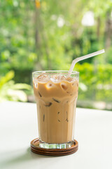 iced latte coffee glass on table