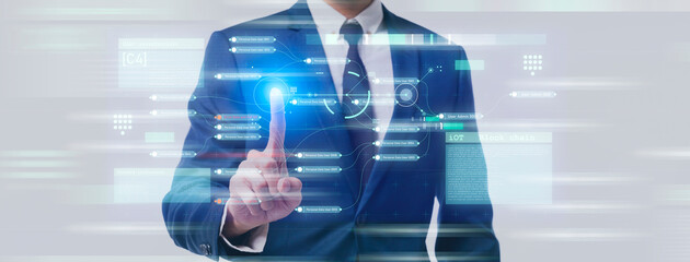Business man press finger on  computer screen viewing company corporate management data dashboard data analytics, sale, performance, productivity, KPI. Business and information technology concept