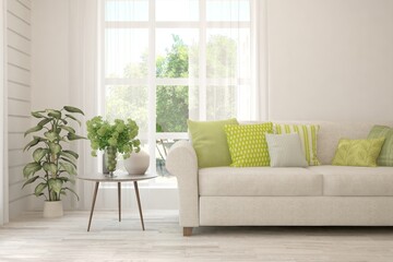 White living room with sofa and summer landscape in window. Scandinavian interior design. 3D illustration