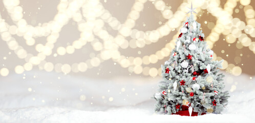 Christmas tree on winter snow floor with light bokeh effect background. 3d rendering