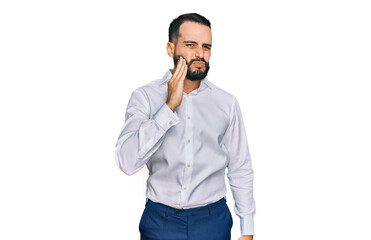 Fototapeta premium Young man with beard wearing business shirt touching mouth with hand with painful expression because of toothache or dental illness on teeth. dentist