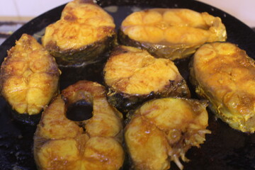 Rohu fish getting shallow fried
