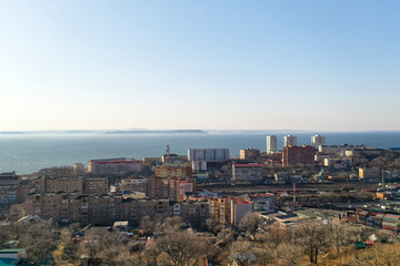 Fototapeta premium Vladivostok, Russia. Urban landscape against the blue sky.