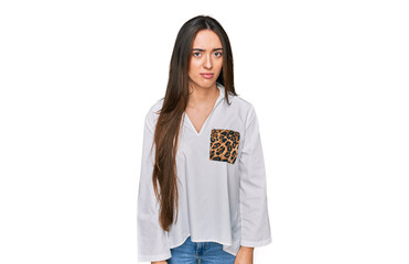 Young hispanic girl wearing casual clothes skeptic and nervous, frowning upset because of problem....