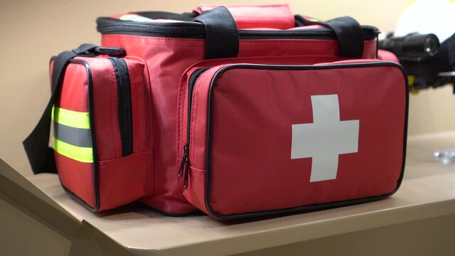 Red first aid equipment emergency bag for accident disaster 