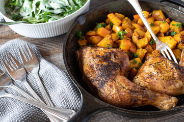 Roasted chicken legs with vegetables